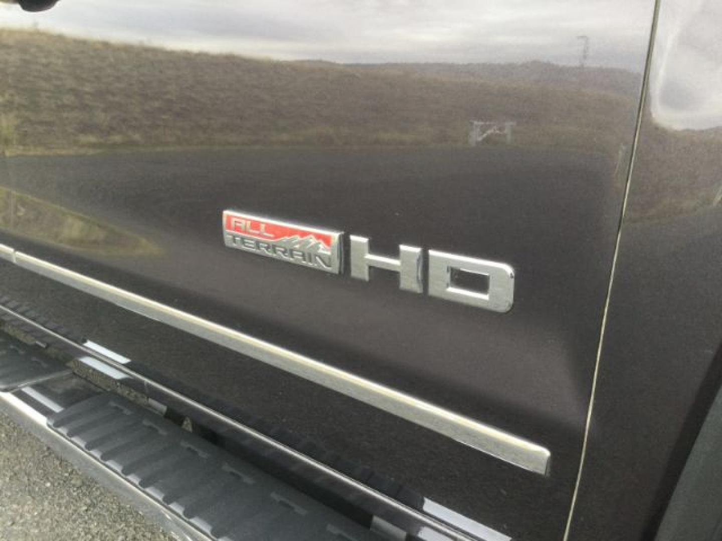 2015 Iridium Metallic /Dark Ash/Jet Black GMC 3500 Crew 4x4 SLT (1GT423C85FF) with an 6.6L V8 OHV 32V TURBO DIESEL engine, 6-Speed Automatic transmission, located at 1801 Main Street, Lewiston, 83501, (208) 743-9371, 46.417065, -117.004799- Photo#23