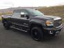 2015 Iridium Metallic /Dark Ash/Jet Black GMC Sierra 3500HD SLT (1GT423C85FF) with an 6.6L V8 OHV 32V TURBO DIESEL engine, 6-Speed Automatic transmission, located at 1801 Main Street, Lewiston, 83501, (208) 743-9371, 46.417065, -117.004799 - Photo#1