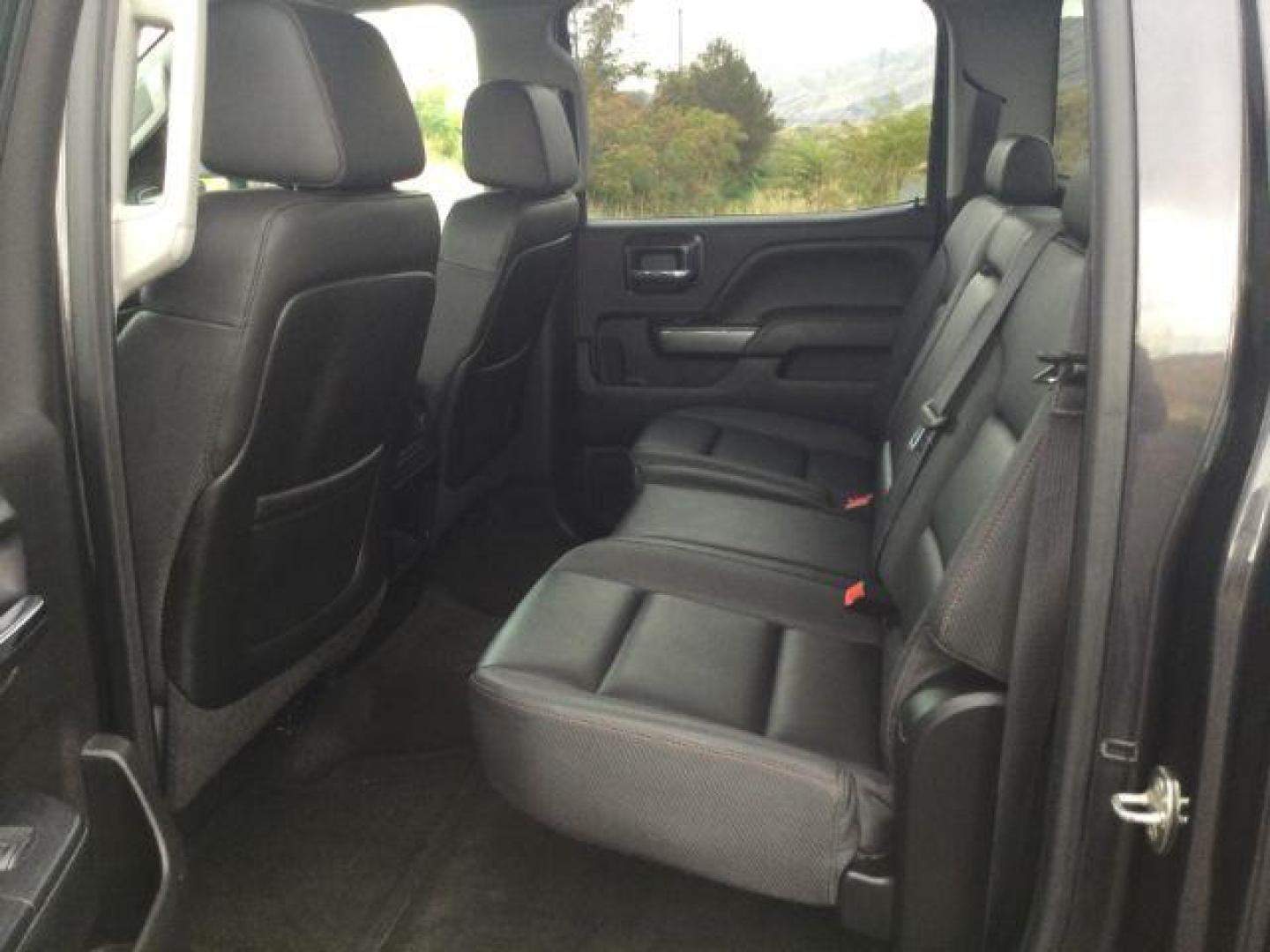 2015 Iridium Metallic /Dark Ash/Jet Black GMC Sierra 3500HD SLT (1GT423C85FF) with an 6.6L V8 OHV 32V TURBO DIESEL engine, 6-Speed Automatic transmission, located at 1801 Main Street, Lewiston, 83501, (208) 743-9371, 46.417065, -117.004799 - Photo#5