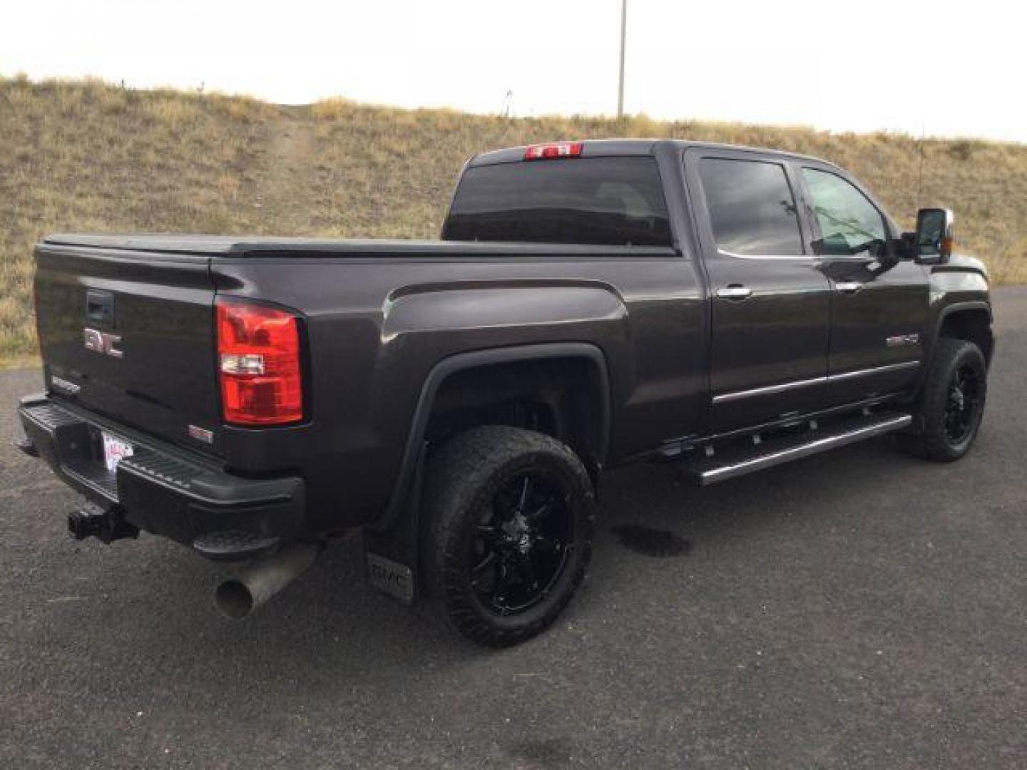 2015 Iridium Metallic /Dark Ash/Jet Black GMC Sierra 3500HD SLT (1GT423C85FF) with an 6.6L V8 OHV 32V TURBO DIESEL engine, 6-Speed Automatic transmission, located at 1801 Main Street, Lewiston, 83501, (208) 743-9371, 46.417065, -117.004799 - Photo#8