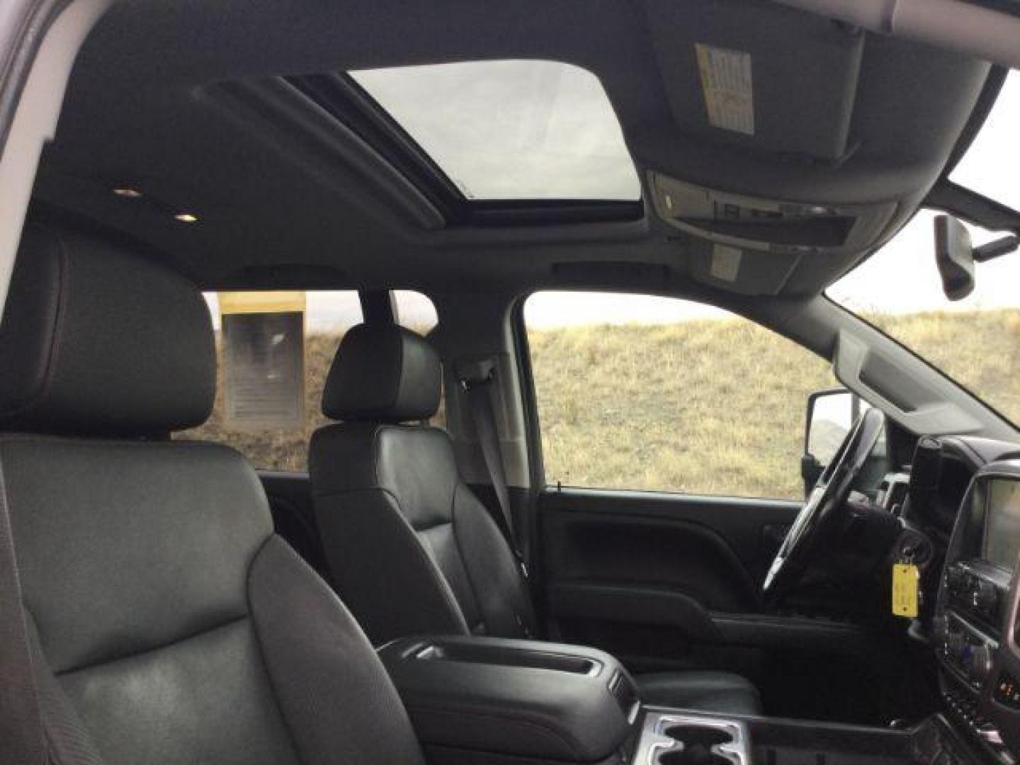 2015 Iridium Metallic /Dark Ash/Jet Black GMC Sierra 3500HD SLT (1GT423C85FF) with an 6.6L V8 OHV 32V TURBO DIESEL engine, 6-Speed Automatic transmission, located at 1801 Main Street, Lewiston, 83501, (208) 743-9371, 46.417065, -117.004799 - Photo#14