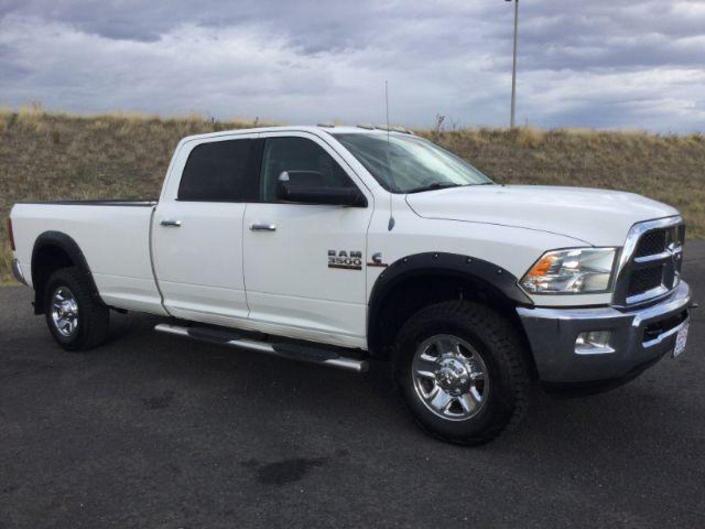 2013 Bright White Clearcoat /Diesel Gray/Black RAM 3500 SLT Crew Cab LWB 4WD (3C63R3HL8DG) with an 6.7L L6 OHV 24V TURBO DIESEL engine, 6-Speed Manual Transmission transmission, located at 1801 Main Street, Lewiston, 83501, (208) 743-9371, 46.417065, -117.004799 - Photo#2