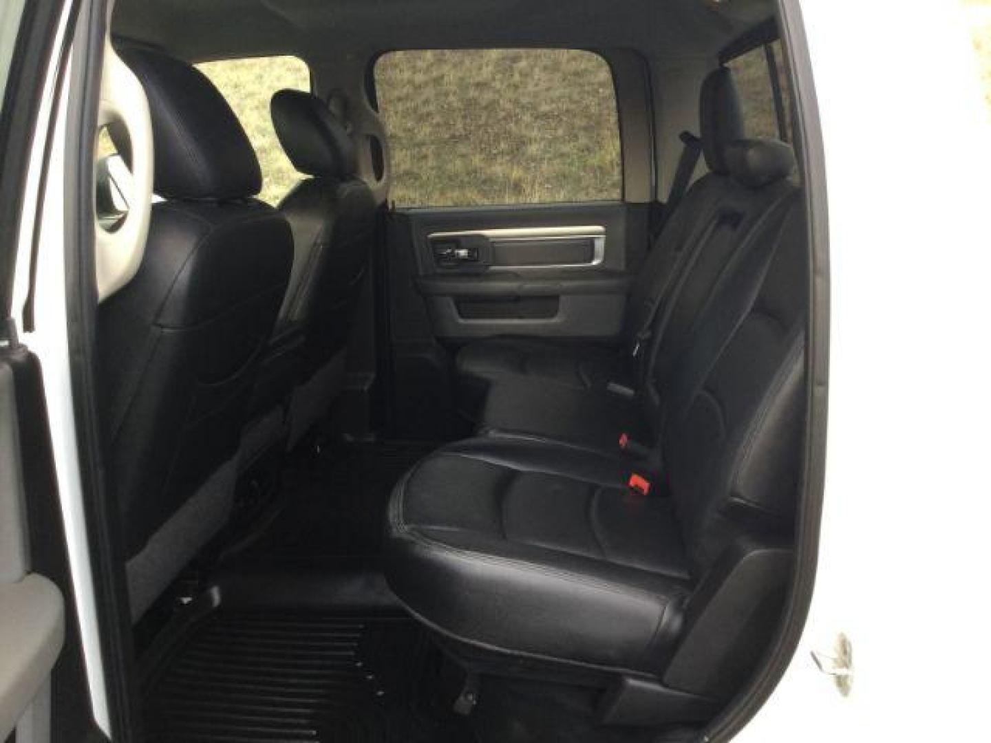 2013 Bright White Clearcoat /Diesel Gray/Black RAM 3500 SLT Crew Cab LWB 4WD (3C63R3HL8DG) with an 6.7L L6 OHV 24V TURBO DIESEL engine, 6-Speed Manual Transmission transmission, located at 1801 Main Street, Lewiston, 83501, (208) 743-9371, 46.417065, -117.004799 - Photo#5