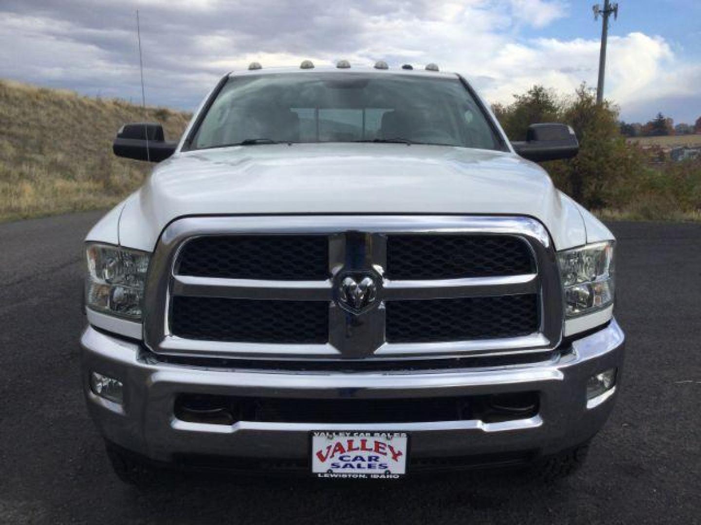 2013 Bright White Clearcoat /Diesel Gray/Black RAM 3500 SLT Crew Cab LWB 4WD (3C63R3HL8DG) with an 6.7L L6 OHV 24V TURBO DIESEL engine, 6-Speed Manual Transmission transmission, located at 1801 Main Street, Lewiston, 83501, (208) 743-9371, 46.417065, -117.004799 - Photo#11