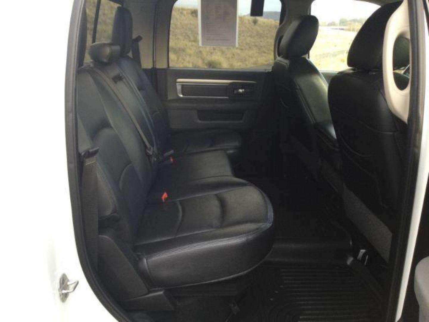 2013 Bright White Clearcoat /Diesel Gray/Black RAM 3500 SLT Crew Cab LWB 4WD (3C63R3HL8DG) with an 6.7L L6 OHV 24V TURBO DIESEL engine, 6-Speed Manual Transmission transmission, located at 1801 Main Street, Lewiston, 83501, (208) 743-9371, 46.417065, -117.004799 - Photo#14