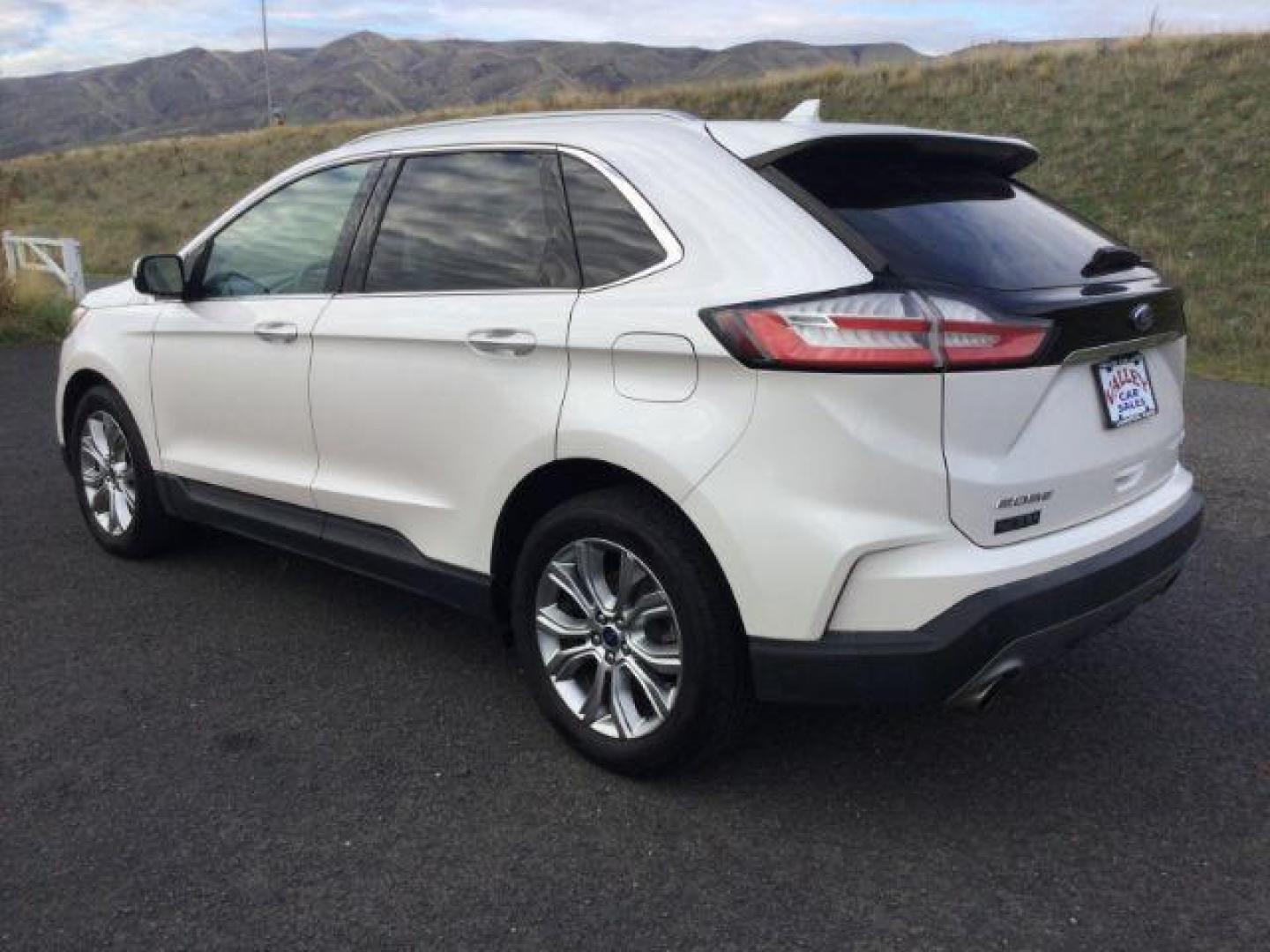 2019 White Platinum Tri-Coat Metallic /Ceramic, premium leather Ford Edge Titanium AWD (2FMPK4K98KB) with an 2.0L L4 DOHC 16V engine, 8-Speed Automatic transmission, located at 1801 Main Street, Lewiston, 83501, (208) 743-9371, 46.417065, -117.004799 - Photo#2