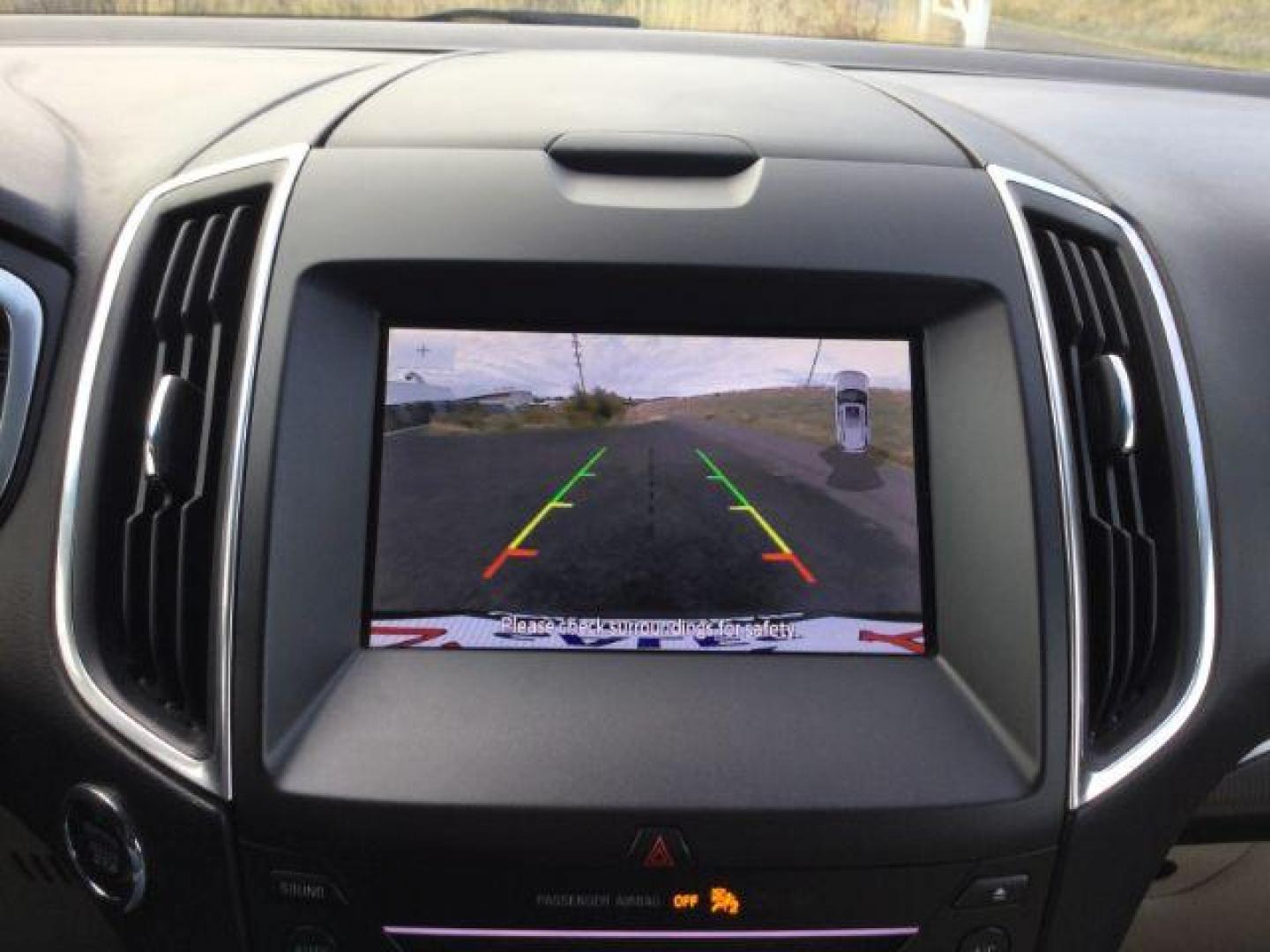 2019 White Platinum Tri-Coat Metallic /Ceramic, premium leather Ford Edge Titanium AWD (2FMPK4K98KB) with an 2.0L L4 DOHC 16V engine, 8-Speed Automatic transmission, located at 1801 Main Street, Lewiston, 83501, (208) 743-9371, 46.417065, -117.004799 - Photo#19