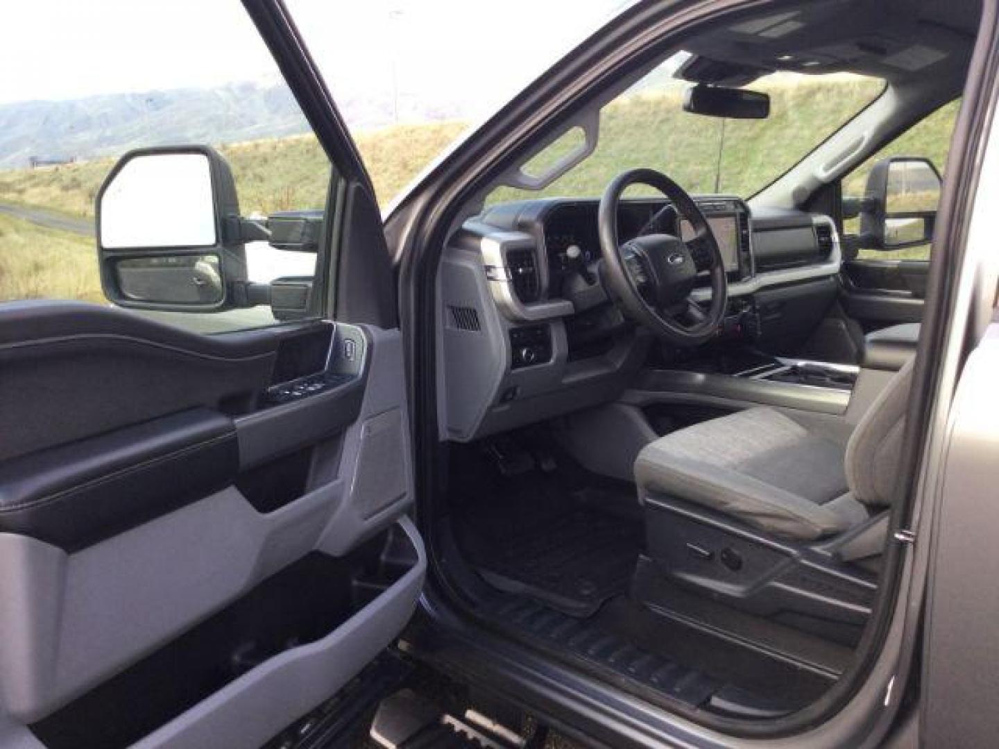 2023 Carbonized Gray Metallic /Medium Dark Slate Ford F-350 Crew Cab XLT Long Bed 4WD (1FT8W3BT4PE) with an Powerstroke 6.7L V-8 diesel direct injection engine, 10 speed automatic transmission, located at 1801 Main Street, Lewiston, 83501, (208) 743-9371, 46.417065, -117.004799 - Photo#4