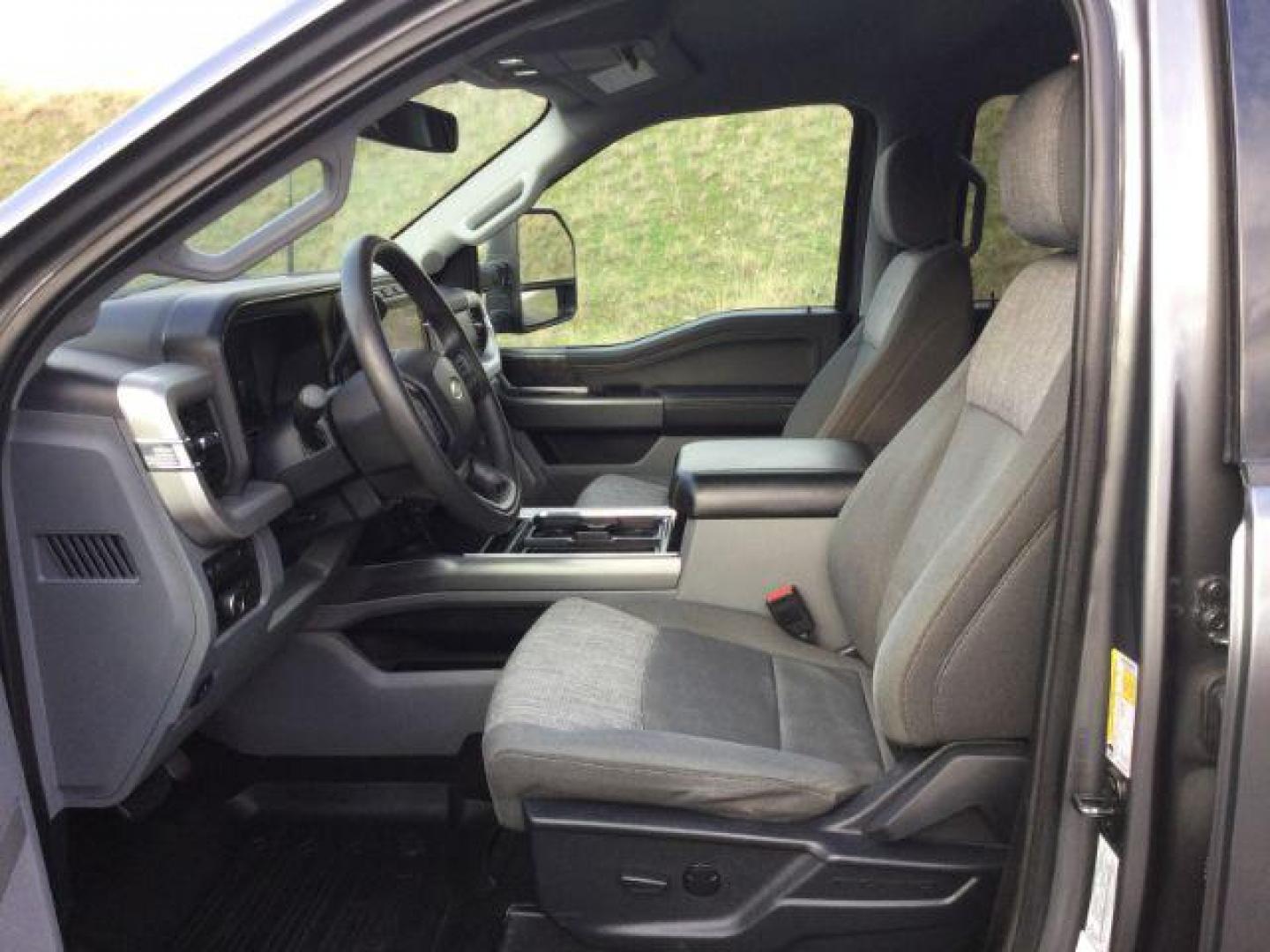 2023 Carbonized Gray Metallic /Medium Dark Slate Ford F-350 Crew Cab XLT Long Bed 4WD (1FT8W3BT4PE) with an Powerstroke 6.7L V-8 diesel direct injection engine, 10 speed automatic transmission, located at 1801 Main Street, Lewiston, 83501, (208) 743-9371, 46.417065, -117.004799 - Photo#5