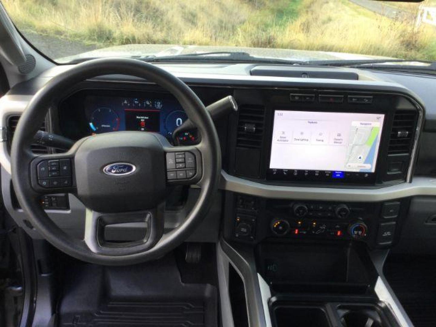 2023 Carbonized Gray Metallic /Medium Dark Slate Ford F-350 Crew Cab XLT Long Bed 4WD (1FT8W3BT4PE) with an Powerstroke 6.7L V-8 diesel direct injection engine, 10 speed automatic transmission, located at 1801 Main Street, Lewiston, 83501, (208) 743-9371, 46.417065, -117.004799 - Photo#6