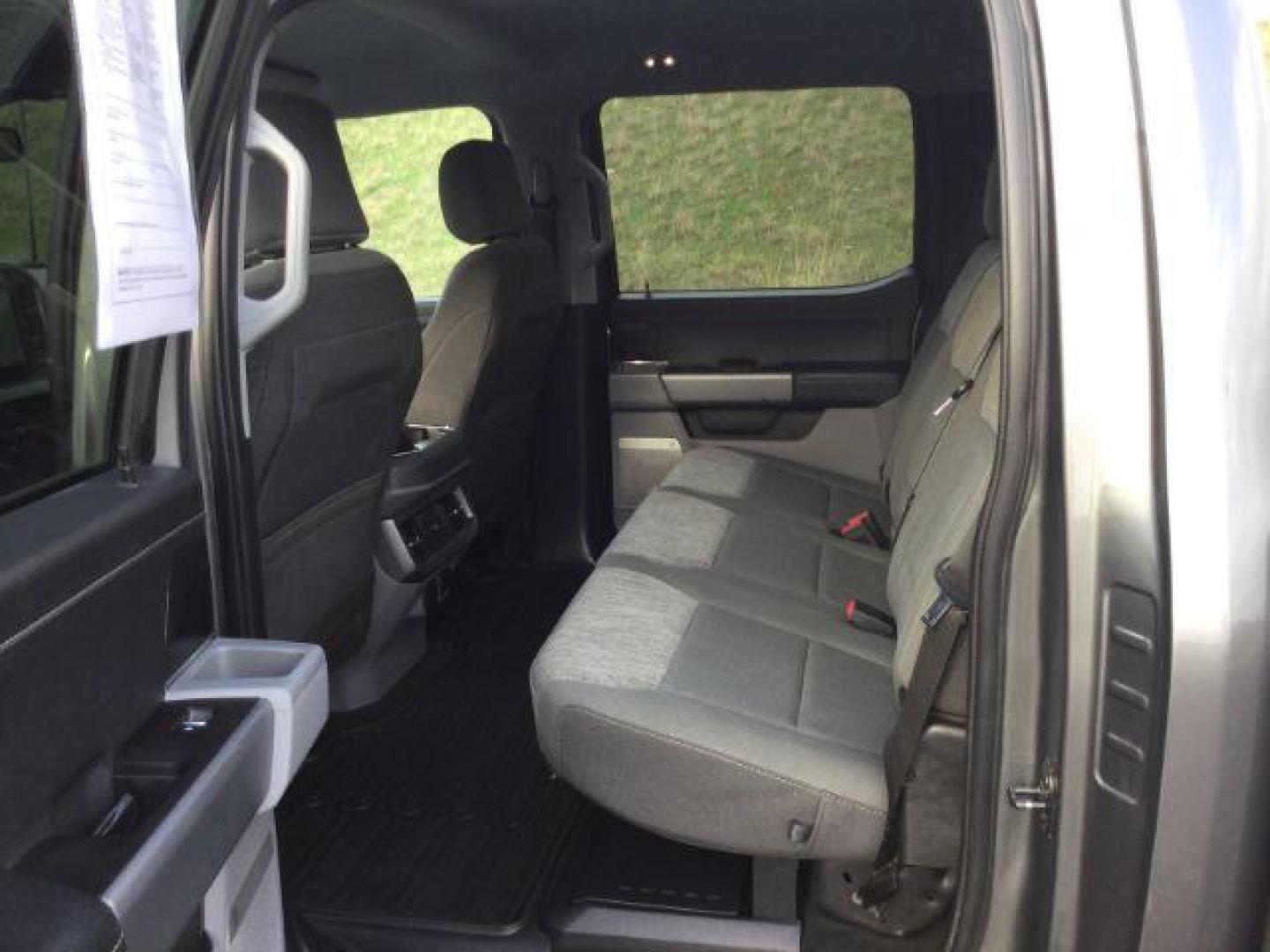 2023 Carbonized Gray Metallic /Medium Dark Slate Ford F-350 Crew Cab XLT Long Bed 4WD (1FT8W3BT4PE) with an Powerstroke 6.7L V-8 diesel direct injection engine, 10 speed automatic transmission, located at 1801 Main Street, Lewiston, 83501, (208) 743-9371, 46.417065, -117.004799 - Photo#9