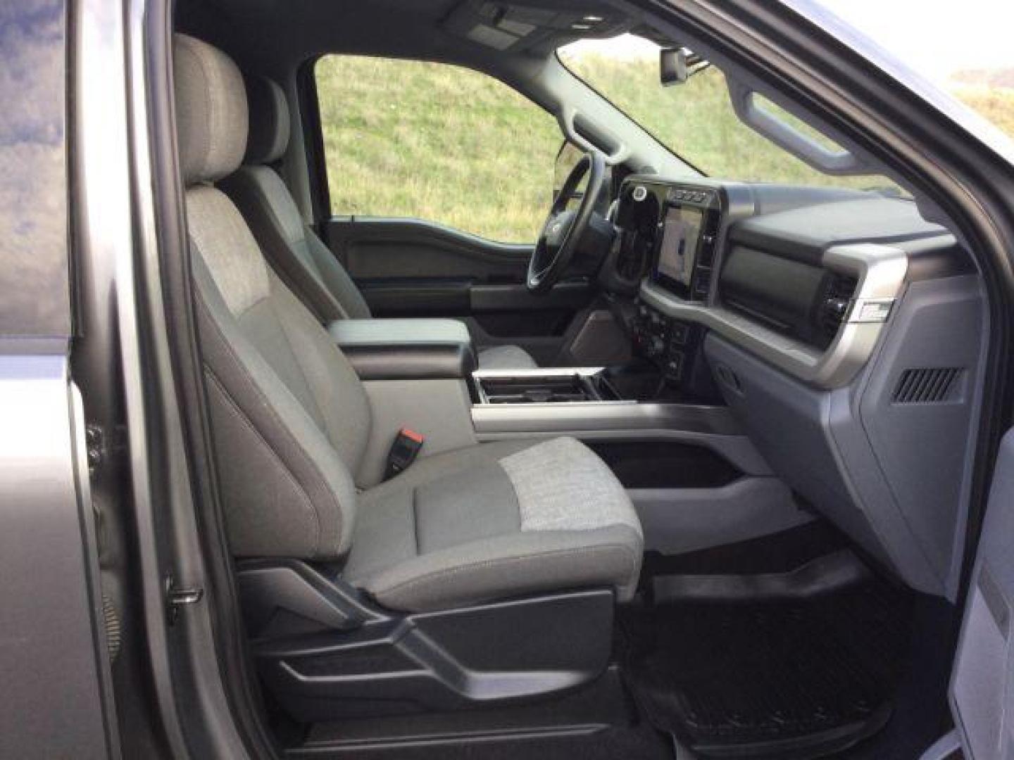 2023 Carbonized Gray Metallic /Medium Dark Slate Ford F-350 Crew Cab XLT Long Bed 4WD (1FT8W3BT4PE) with an Powerstroke 6.7L V-8 diesel direct injection engine, 10 speed automatic transmission, located at 1801 Main Street, Lewiston, 83501, (208) 743-9371, 46.417065, -117.004799 - Photo#19