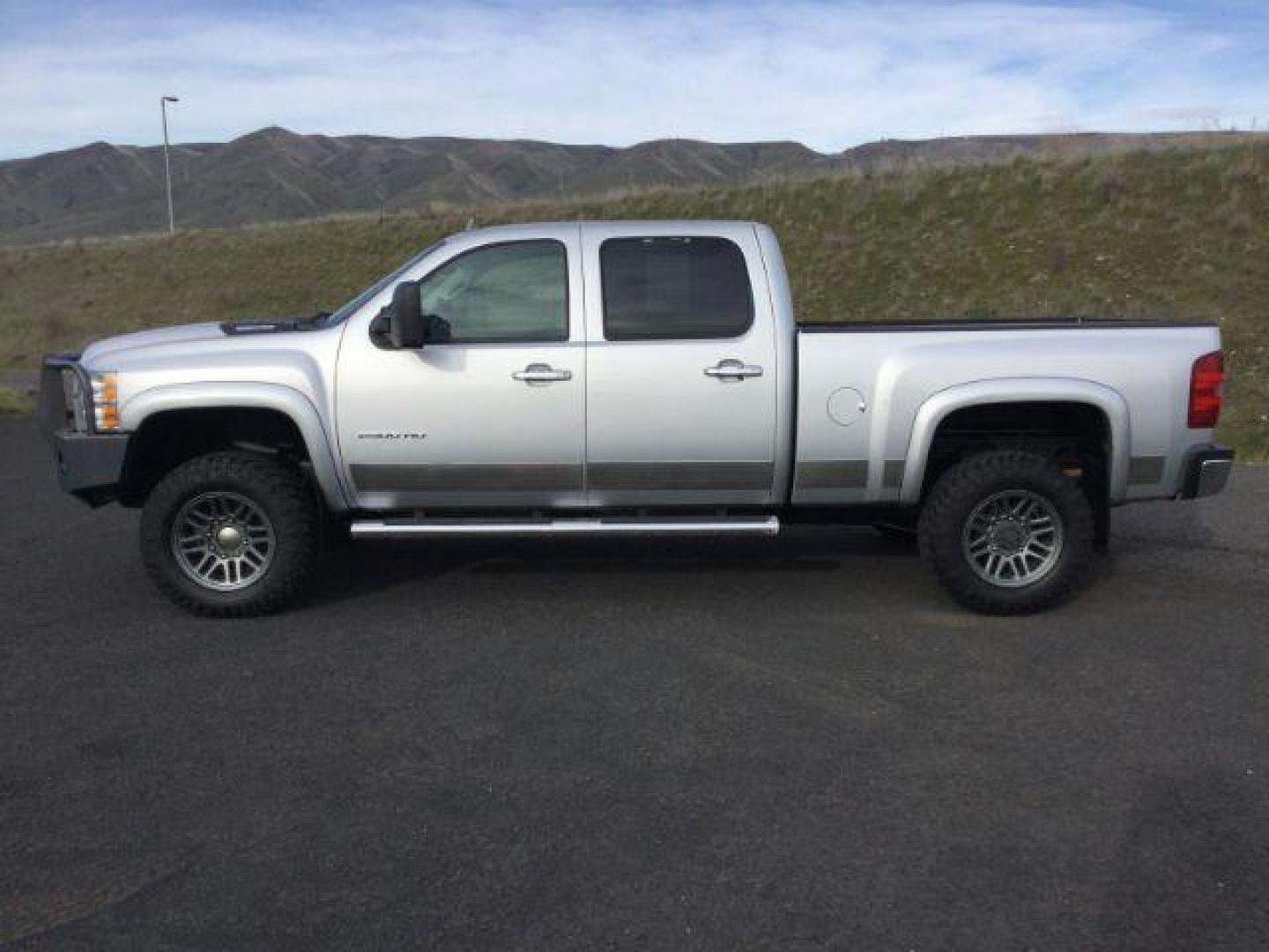2012 Silver Ice Metallic /Ebony Chevrolet Silverado 2500HD LTZ (1GC1KYE82CF) with an Duramax 6.6L V-8 diesel direct injection engine, 6-Speed Automatic transmission, located at 1801 Main Street, Lewiston, 83501, (208) 743-9371, 46.417065, -117.004799 - Photo#1