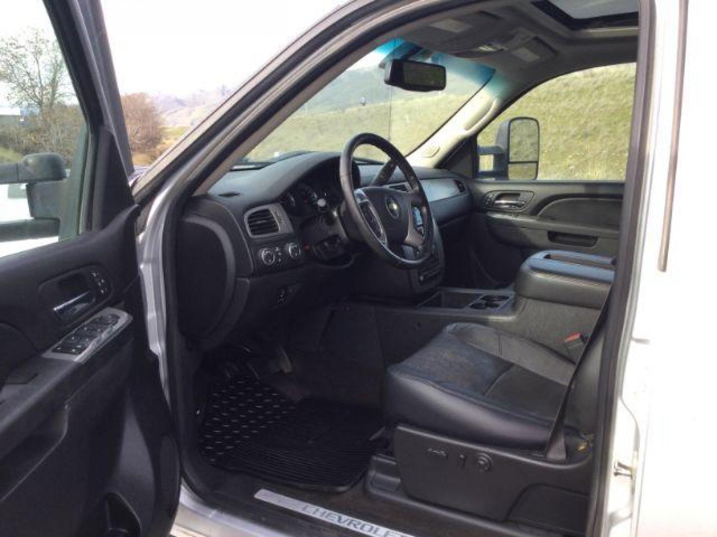 2012 Silver Ice Metallic /Ebony Chevrolet Silverado 2500HD LTZ (1GC1KYE82CF) with an Duramax 6.6L V-8 diesel direct injection engine, 6-Speed Automatic transmission, located at 1801 Main Street, Lewiston, 83501, (208) 743-9371, 46.417065, -117.004799 - Photo#3
