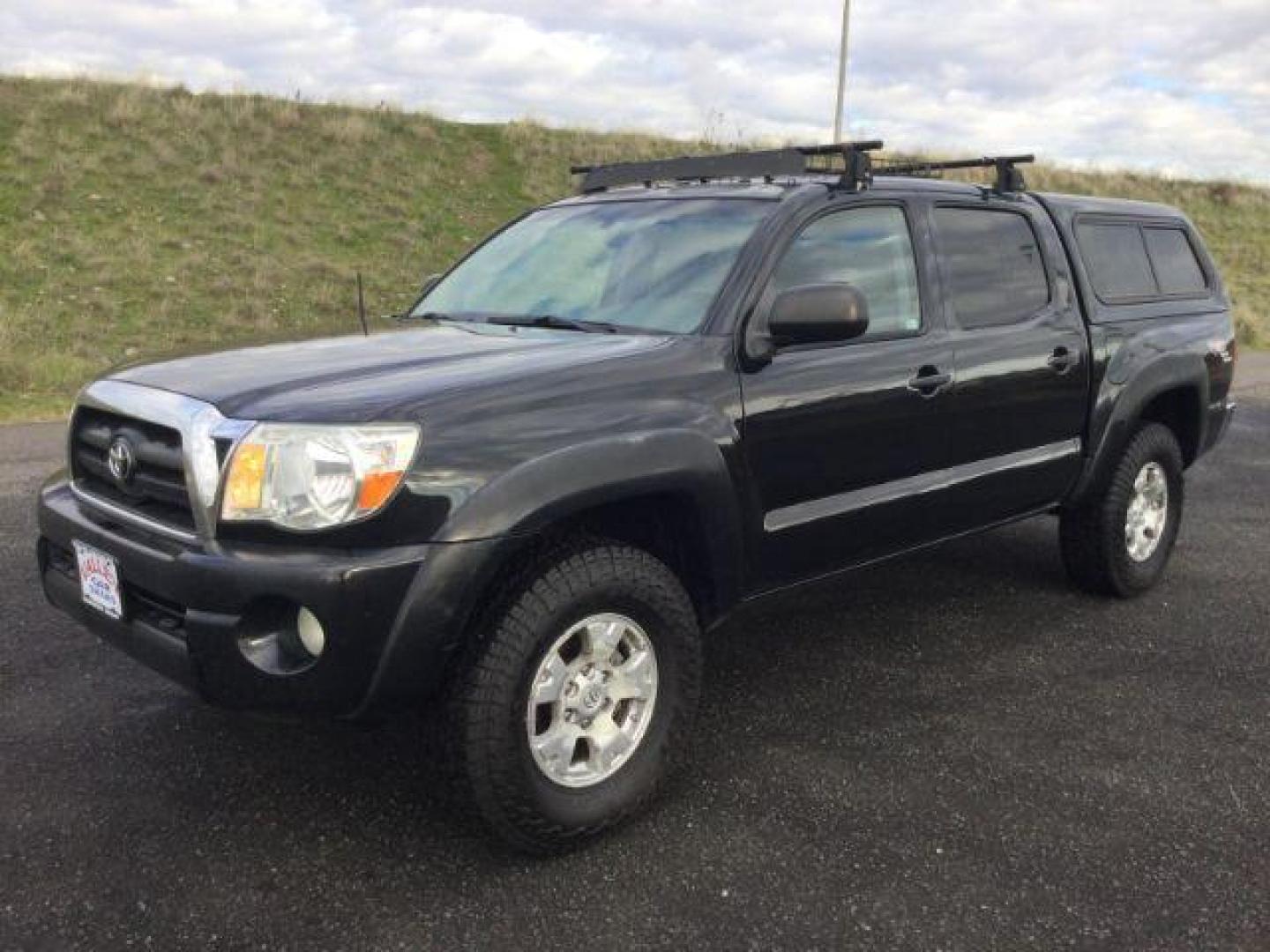 2006 Black Sand Pearl /Graphite Toyota Tacoma TRD Off Road Double Cab 4x4 (5TELU42N76Z) with an 4L V-6 DOHC engine, 6-Speed Manual Transmission transmission, located at 1801 Main Street, Lewiston, 83501, (208) 743-9371, 46.417065, -117.004799 - Photo#0