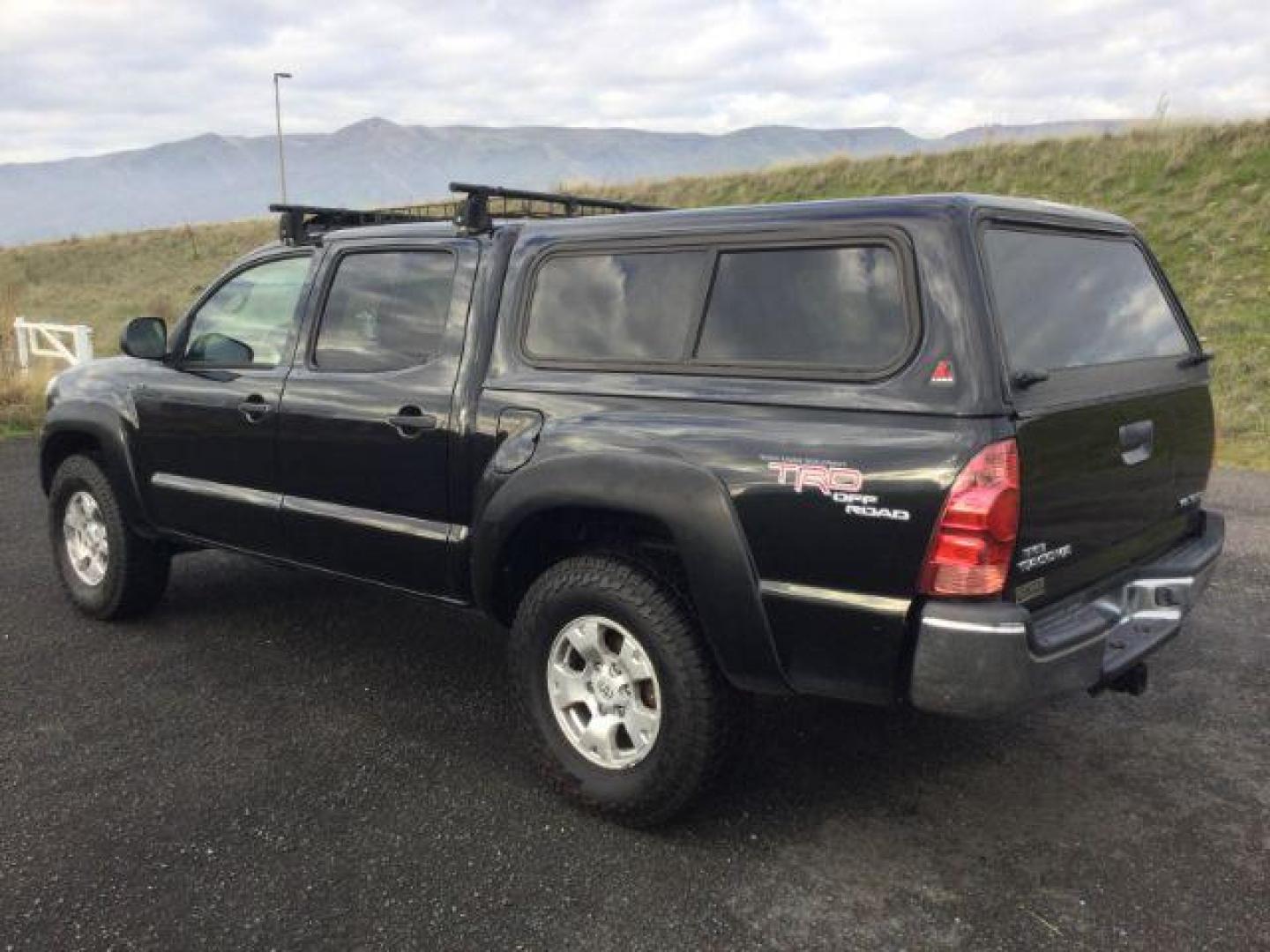2006 Black Sand Pearl /Graphite Toyota Tacoma TRD Off Road Double Cab 4x4 (5TELU42N76Z) with an 4L V-6 DOHC engine, 6-Speed Manual Transmission transmission, located at 1801 Main Street, Lewiston, 83501, (208) 743-9371, 46.417065, -117.004799 - Photo#2