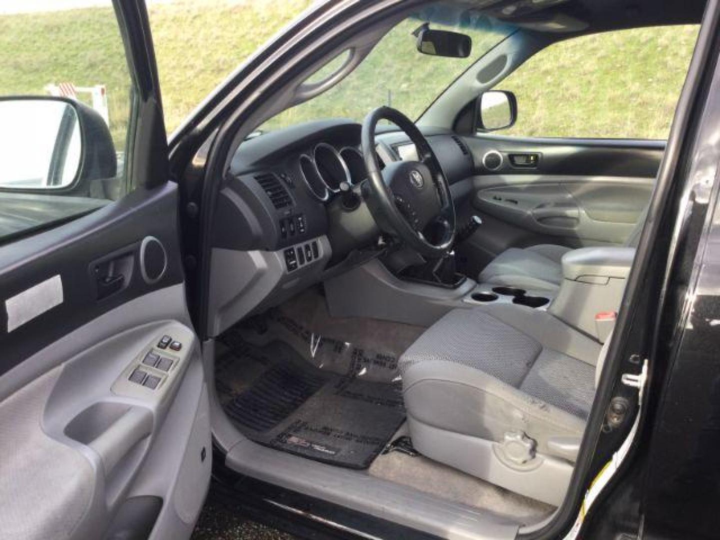 2006 Black Sand Pearl /Graphite Toyota Tacoma TRD Off Road Double Cab 4x4 (5TELU42N76Z) with an 4L V-6 DOHC engine, 6-Speed Manual Transmission transmission, located at 1801 Main Street, Lewiston, 83501, (208) 743-9371, 46.417065, -117.004799 - Photo#3