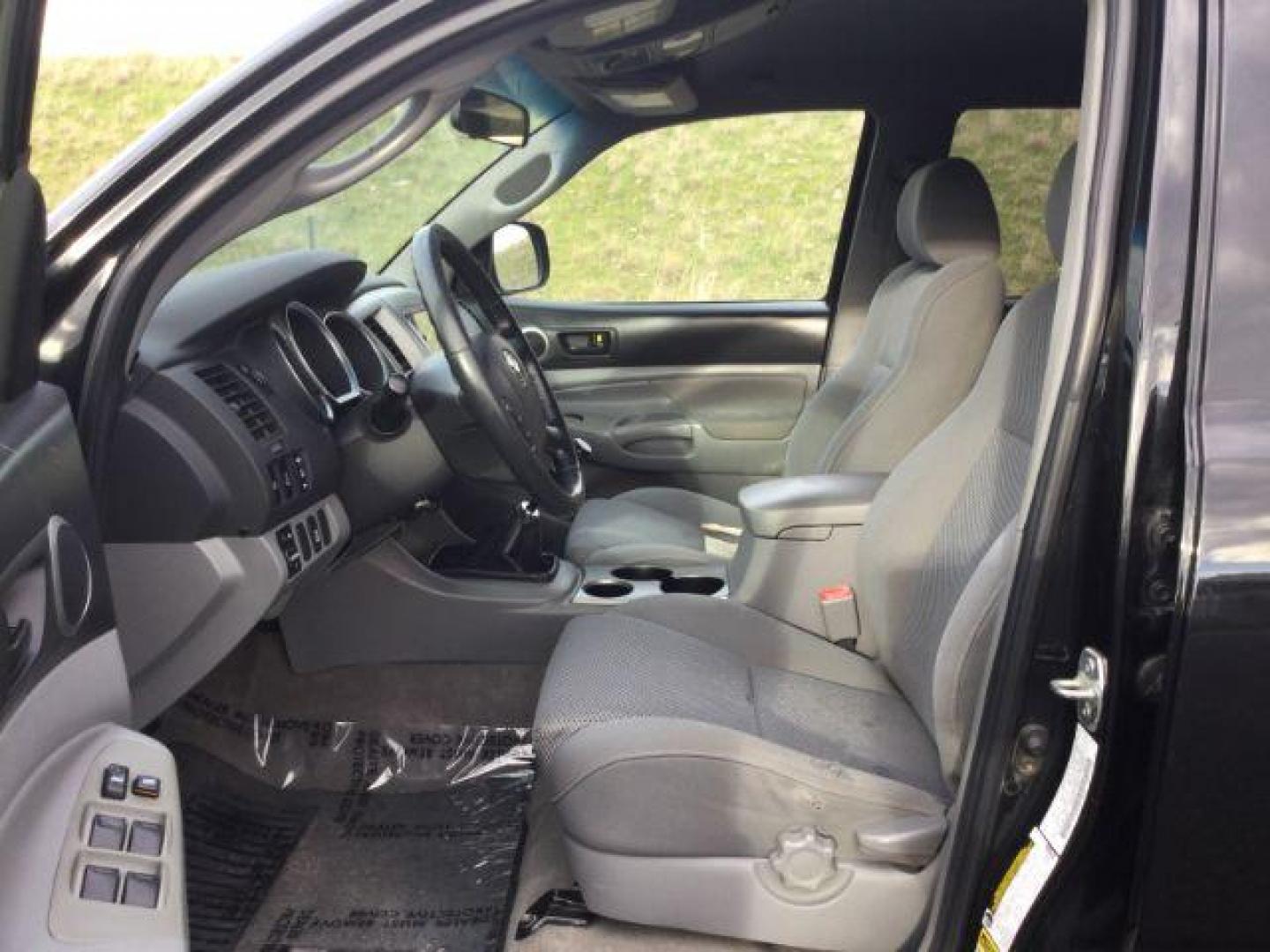 2006 Black Sand Pearl /Graphite Toyota Tacoma TRD Off Road Double Cab 4x4 (5TELU42N76Z) with an 4L V-6 DOHC engine, 6-Speed Manual Transmission transmission, located at 1801 Main Street, Lewiston, 83501, (208) 743-9371, 46.417065, -117.004799 - Photo#4