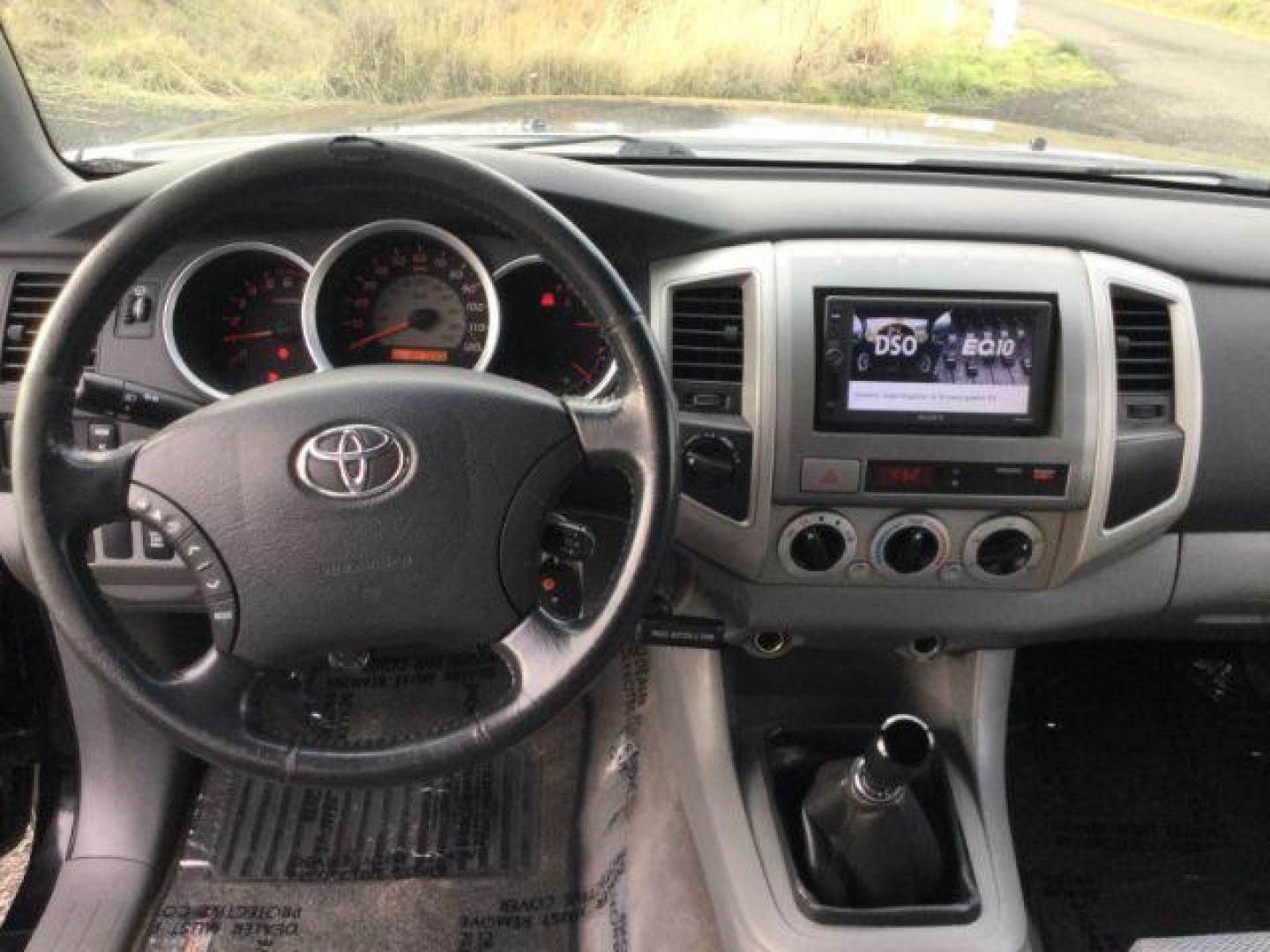 2006 Black Sand Pearl /Graphite Toyota Tacoma TRD Off Road Double Cab 4x4 (5TELU42N76Z) with an 4L V-6 DOHC engine, 6-Speed Manual Transmission transmission, located at 1801 Main Street, Lewiston, 83501, (208) 743-9371, 46.417065, -117.004799 - Photo#6