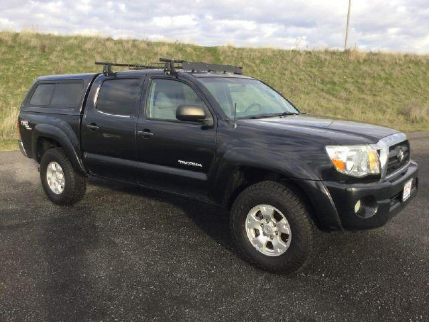 2006 Black Sand Pearl /Graphite Toyota Tacoma TRD Off Road Double Cab 4x4 (5TELU42N76Z) with an 4L V-6 DOHC engine, 6-Speed Manual Transmission transmission, located at 1801 Main Street, Lewiston, 83501, (208) 743-9371, 46.417065, -117.004799 - Photo#8