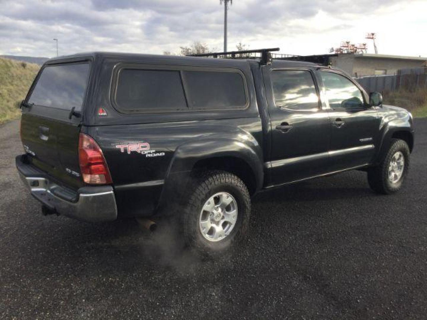 2006 Black Sand Pearl /Graphite Toyota Tacoma TRD Off Road Double Cab 4x4 (5TELU42N76Z) with an 4L V-6 DOHC engine, 6-Speed Manual Transmission transmission, located at 1801 Main Street, Lewiston, 83501, (208) 743-9371, 46.417065, -117.004799 - Photo#9