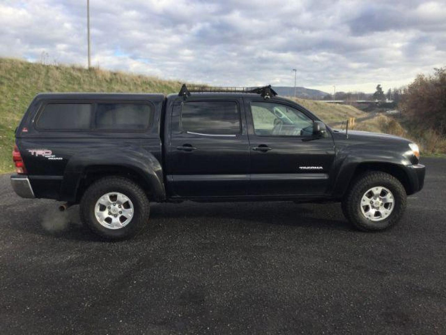 2006 Black Sand Pearl /Graphite Toyota Tacoma TRD Off Road Double Cab 4x4 (5TELU42N76Z) with an 4L V-6 DOHC engine, 6-Speed Manual Transmission transmission, located at 1801 Main Street, Lewiston, 83501, (208) 743-9371, 46.417065, -117.004799 - Photo#10