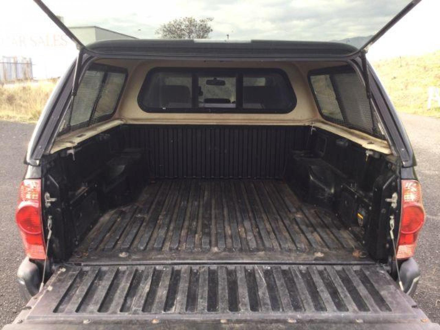 2006 Black Sand Pearl /Graphite Toyota Tacoma TRD Off Road Double Cab 4x4 (5TELU42N76Z) with an 4L V-6 DOHC engine, 6-Speed Manual Transmission transmission, located at 1801 Main Street, Lewiston, 83501, (208) 743-9371, 46.417065, -117.004799 - Photo#12