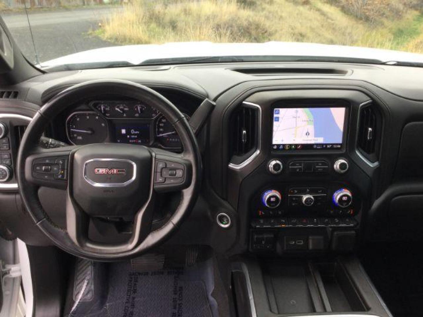 2022 Summit White /Jet Black w/Kalahari Accents GMC Sierra 3500HD 4WD Crew Cab Standard Bed AT4 (1GT49VEY0NF) with an Duramax 6.6L V-8 diesel direct injection engine, 10-speed automatic transmission, located at 1801 Main Street, Lewiston, 83501, (208) 743-9371, 46.417065, -117.004799 - Photo#7