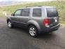 2015 Modern Steel Metallic /Black Honda Pilot EX-L (5FNYF4H79FB) with an 3.5L V-6 i-VTEC VCM variable valve control engine, 5-Speed Automatic transmission, located at 1801 Main Street, Lewiston, 83501, (208) 743-9371, 46.417065, -117.004799 - Photo#2