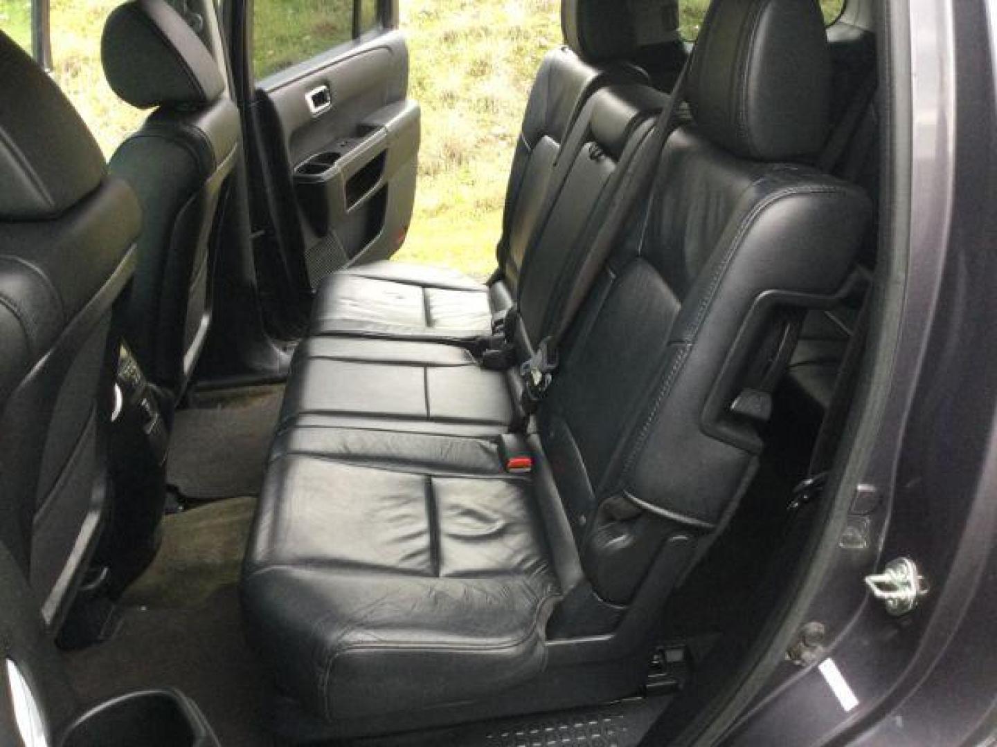 2015 Modern Steel Metallic /Black Honda Pilot EX-L (5FNYF4H79FB) with an 3.5L V-6 i-VTEC VCM variable valve control engine, 5-Speed Automatic transmission, located at 1801 Main Street, Lewiston, 83501, (208) 743-9371, 46.417065, -117.004799 - Photo#4