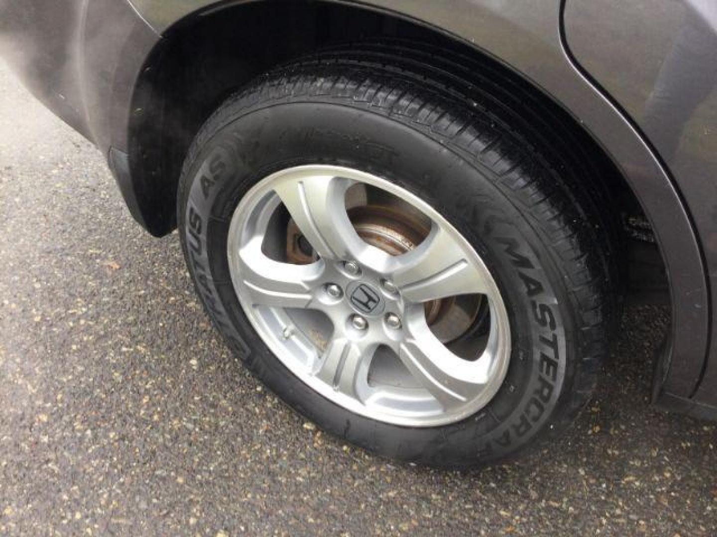 2015 Modern Steel Metallic /Black Honda Pilot EX-L (5FNYF4H79FB) with an 3.5L V-6 i-VTEC VCM variable valve control engine, 5-Speed Automatic transmission, located at 1801 Main Street, Lewiston, 83501, (208) 743-9371, 46.417065, -117.004799 - Photo#18