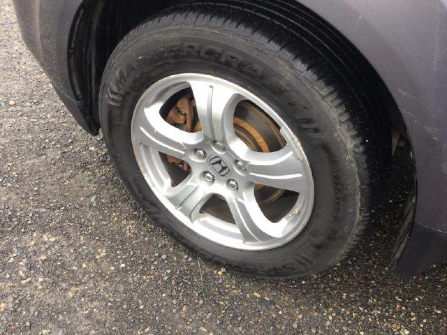 2015 Modern Steel Metallic /Black Honda Pilot EX-L (5FNYF4H79FB) with an 3.5L V-6 i-VTEC VCM variable valve control engine, 5-Speed Automatic transmission, located at 1801 Main Street, Lewiston, 83501, (208) 743-9371, 46.417065, -117.004799 - Photo#21