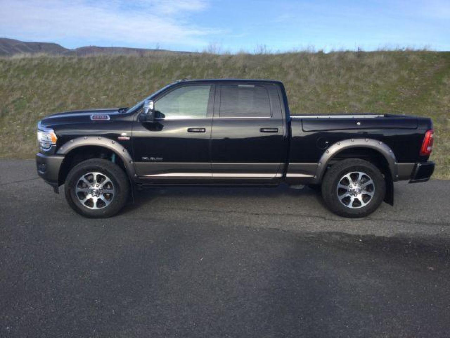 2023 Diamond Black Crystal Pearlcoat /Cattle Tan/Black Ram 2500 Limited Longhorn Crew Cab 4x4 6'4 Box (3C6UR5GLXPG) with an Cummins 6.7L I-6 diesel direct injection engine, 6-SPEED AUTOMATIC transmission, located at 1801 Main Street, Lewiston, 83501, (208) 743-9371, 46.417065, -117.004799 - Photo#1