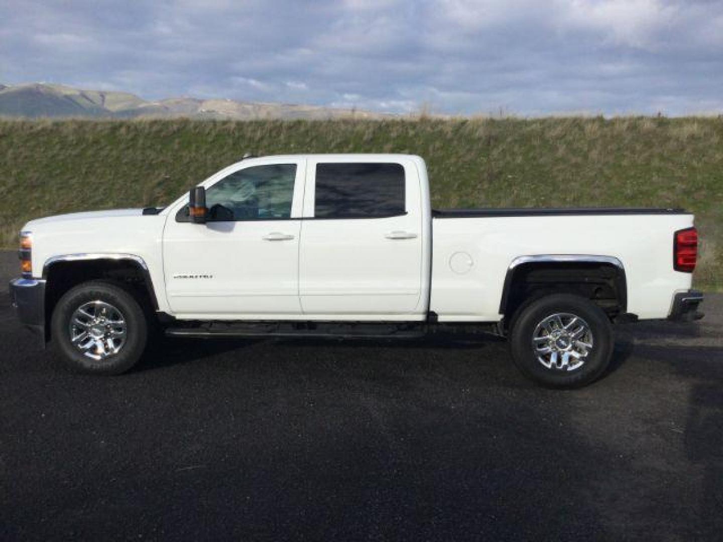 2016 Summit White Chevrolet Silverado 2500HD LT (1GC1KVEG0GF) , located at 1801 Main Street, Lewiston, 83501, (208) 743-9371, 46.417065, -117.004799 - Photo#2
