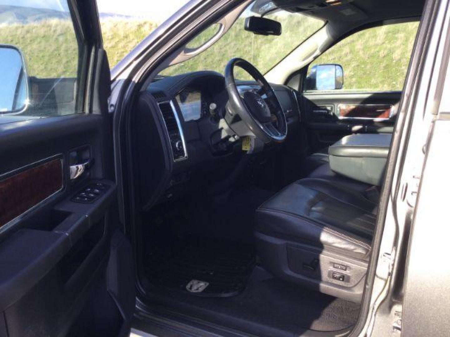 2012 Mineral Gray Metallic Clearcoat /Black Leather Ram 2500 Laramie (3C6UD5NL1CG) with an Cummins 6.7L I-6 diesel direct injection engine, 6-Speed Automatic transmission, located at 1801 Main Street, Lewiston, 83501, (208) 743-9371, 46.417065, -117.004799 - Photo#2