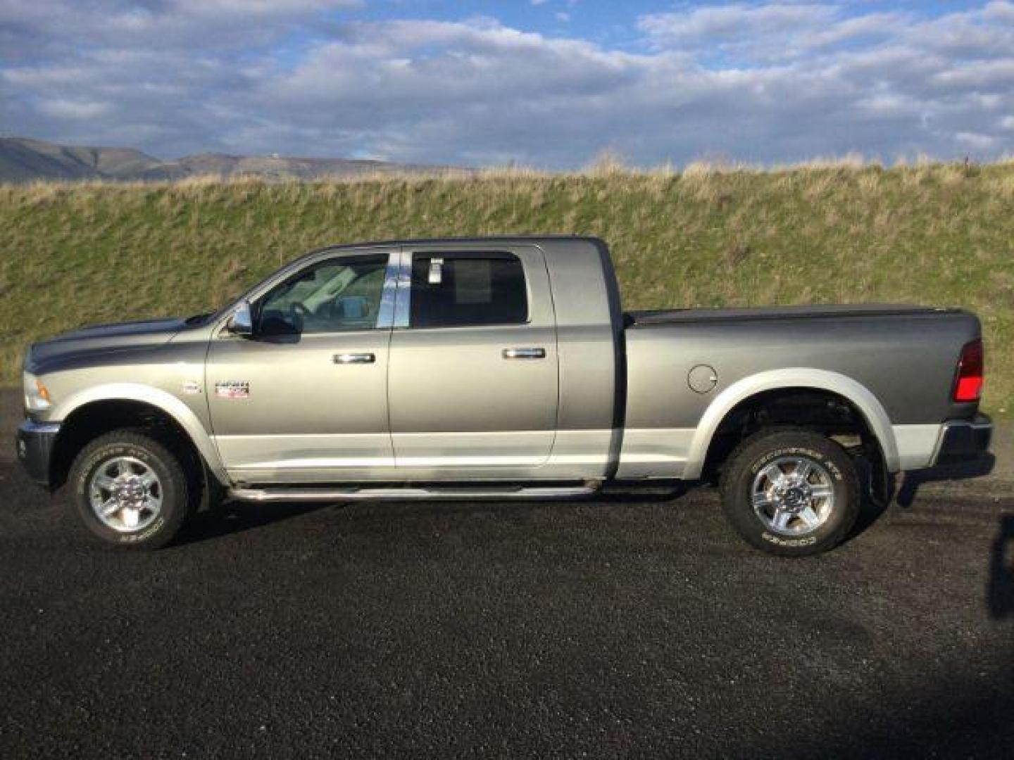 2012 Mineral Gray Metallic Clearcoat /Black Leather Ram 2500 Laramie (3C6UD5NL1CG) with an Cummins 6.7L I-6 diesel direct injection engine, 6-Speed Automatic transmission, located at 1801 Main Street, Lewiston, 83501, (208) 743-9371, 46.417065, -117.004799 - Photo#5