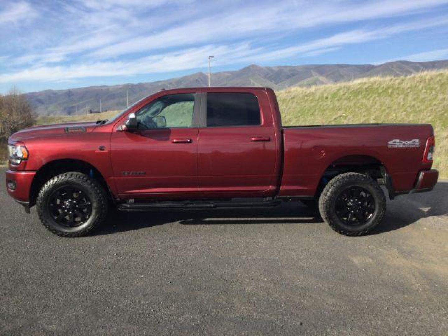 2021 Delmonico Red Pearlcoat /Black Ram 2500 Big Horn Crew Cab 4x4 6'4 Box (3C6UR5DL8MG) with an Cummins 6.7L I-6 diesel direct injection engine, 6-Speed Automatic transmission, located at 1801 Main Street, Lewiston, 83501, (208) 743-9371, 46.417065, -117.004799 - Photo#1