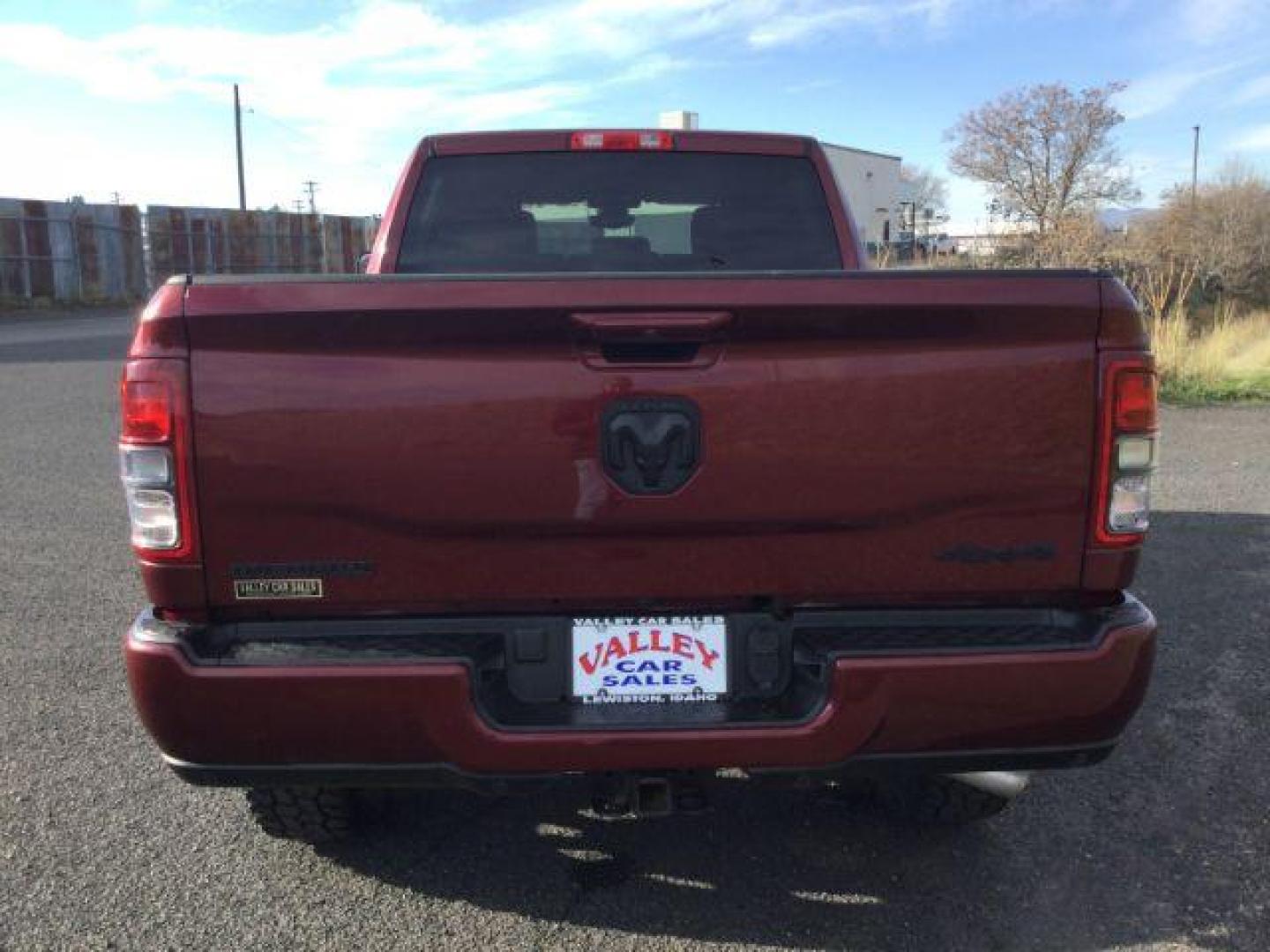 2021 Delmonico Red Pearlcoat /Black Ram 2500 Big Horn Crew Cab 4x4 6'4 Box (3C6UR5DL8MG) with an Cummins 6.7L I-6 diesel direct injection engine, 6-Speed Automatic transmission, located at 1801 Main Street, Lewiston, 83501, (208) 743-9371, 46.417065, -117.004799 - Photo#3