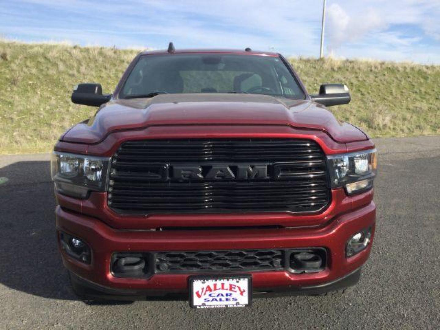 2021 Delmonico Red Pearlcoat /Black Ram 2500 Big Horn Crew Cab 4x4 6'4 Box (3C6UR5DL8MG) with an Cummins 6.7L I-6 diesel direct injection engine, 6-Speed Automatic transmission, located at 1801 Main Street, Lewiston, 83501, (208) 743-9371, 46.417065, -117.004799 - Photo#4
