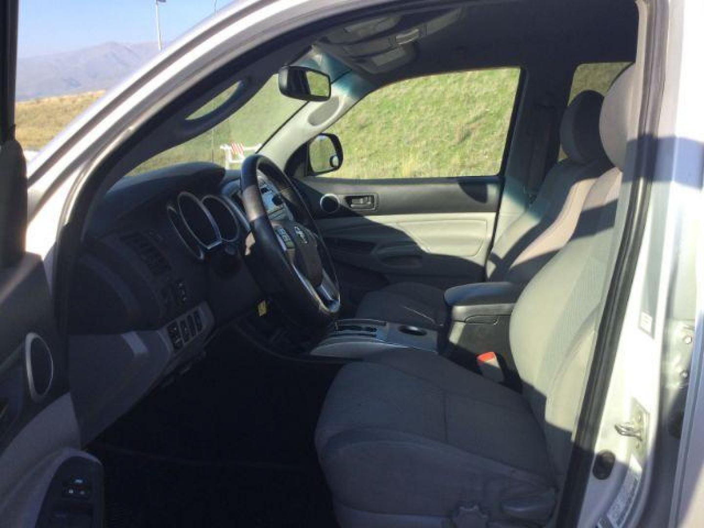 2012 Silver Streak Mica /Graphite Toyota Tacoma TRD Sport Crew Cab Long bed 4x4 (3TMMU4FN2CM) with an 4L V-6 DOHC engine, 5-Speed Automatic transmission, located at 1801 Main Street, Lewiston, 83501, (208) 743-9371, 46.417065, -117.004799 - Photo#4