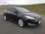 2016 Shadow Black /Charcoal Black Ford Focus Titanium (1FADP3J24GL) with an 2L I-4 gasoline direct injection engine, 6-Speed Automatic transmission, located at 1801 Main Street, Lewiston, 83501, (208) 743-9371, 46.417065, -117.004799 - Photo#1