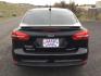 2016 Shadow Black /Charcoal Black Ford Focus Titanium (1FADP3J24GL) with an 2L I-4 gasoline direct injection engine, 6-Speed Automatic transmission, located at 1801 Main Street, Lewiston, 83501, (208) 743-9371, 46.417065, -117.004799 - Photo#8