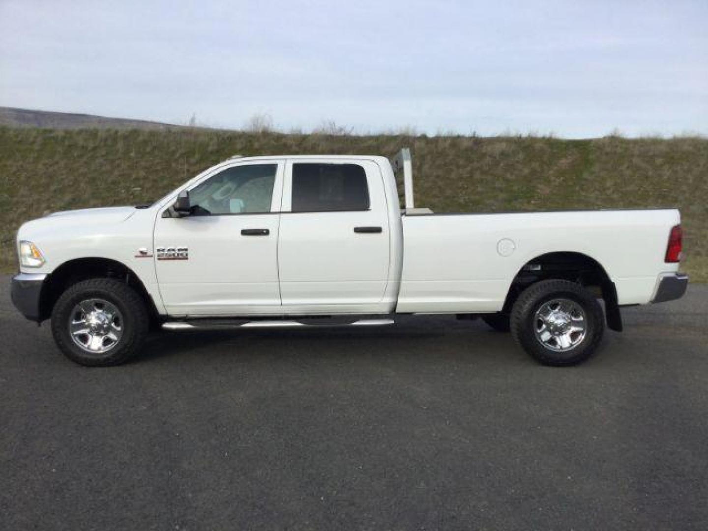 2015 Bright White Clearcoat /Diesel Gray/Black Ram 2500 Tradesman (3C6UR5HLXFG) with an Cummins 6.7L I-6 diesel direct injection engine, 6-Speed Automatic transmission, located at 1801 Main Street, Lewiston, 83501, (208) 743-9371, 46.417065, -117.004799 - Photo#2