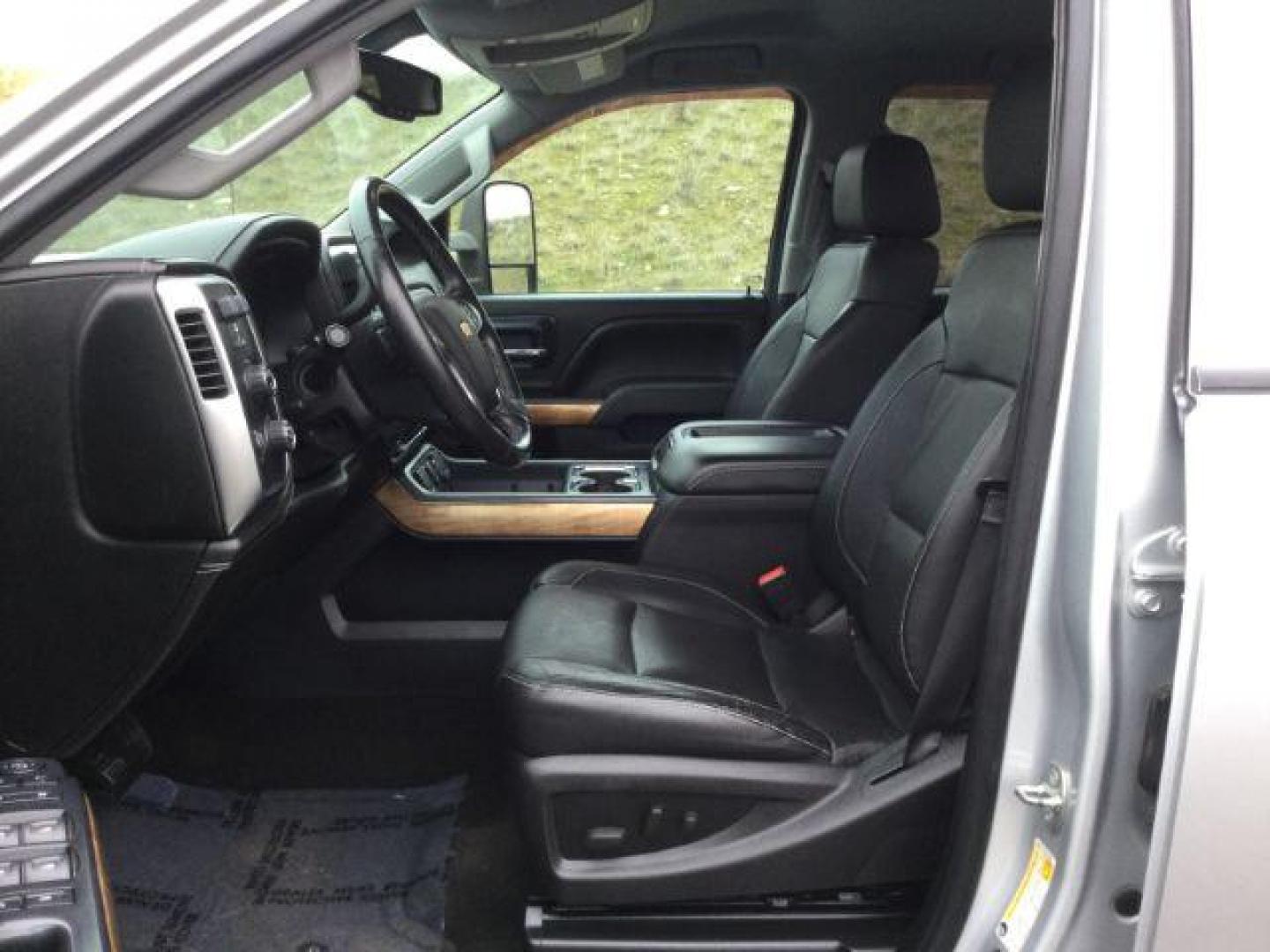 2015 Silver Ice Metallic /Jet Black Chevrolet Silverado 3500HD LTZ (1GC4K0C83FF) with an 6.6L V8 OHV 32V TURBO DIESEL engine, 6-Speed Automatic transmission, located at 1801 Main Street, Lewiston, 83501, (208) 743-9371, 46.417065, -117.004799 - Photo#3