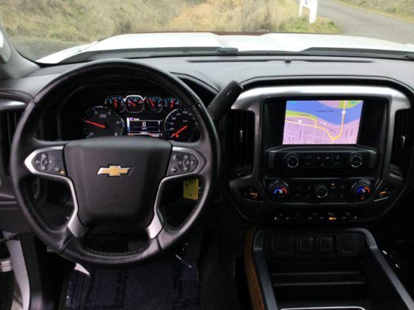 2015 Silver Ice Metallic /Jet Black Chevrolet Silverado 3500HD LTZ (1GC4K0C83FF) with an 6.6L V8 OHV 32V TURBO DIESEL engine, 6-Speed Automatic transmission, located at 1801 Main Street, Lewiston, 83501, (208) 743-9371, 46.417065, -117.004799 - Photo#5
