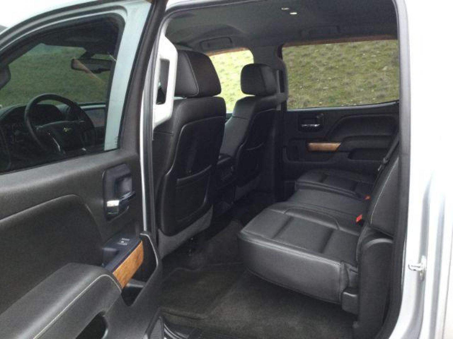 2015 Silver Ice Metallic /Jet Black Chevrolet Silverado 3500HD LTZ (1GC4K0C83FF) with an 6.6L V8 OHV 32V TURBO DIESEL engine, 6-Speed Automatic transmission, located at 1801 Main Street, Lewiston, 83501, (208) 743-9371, 46.417065, -117.004799 - Photo#6