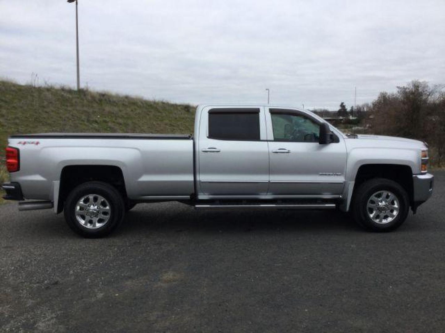 2015 Silver Ice Metallic /Jet Black Chevrolet Silverado 3500HD LTZ (1GC4K0C83FF) with an 6.6L V8 OHV 32V TURBO DIESEL engine, 6-Speed Automatic transmission, located at 1801 Main Street, Lewiston, 83501, (208) 743-9371, 46.417065, -117.004799 - Photo#11