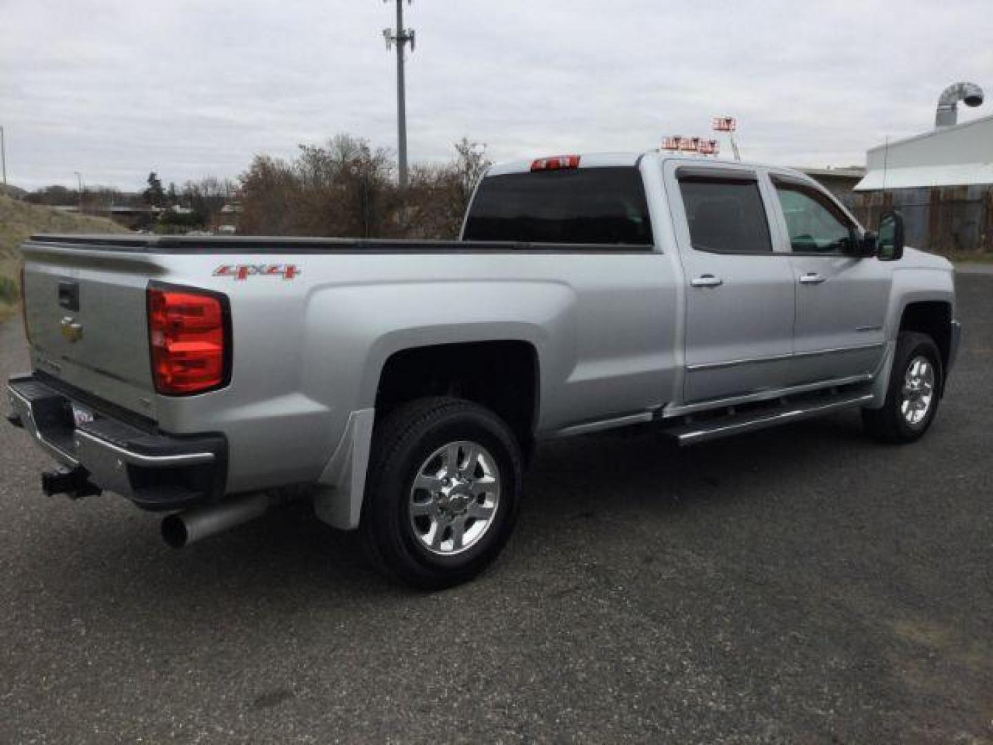 2015 Silver Ice Metallic /Jet Black Chevrolet Silverado 3500HD LTZ (1GC4K0C83FF) with an 6.6L V8 OHV 32V TURBO DIESEL engine, 6-Speed Automatic transmission, located at 1801 Main Street, Lewiston, 83501, (208) 743-9371, 46.417065, -117.004799 - Photo#12