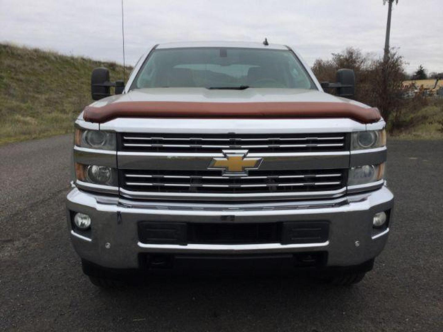 2015 Silver Ice Metallic /Jet Black Chevrolet Silverado 3500HD LTZ (1GC4K0C83FF) with an 6.6L V8 OHV 32V TURBO DIESEL engine, 6-Speed Automatic transmission, located at 1801 Main Street, Lewiston, 83501, (208) 743-9371, 46.417065, -117.004799 - Photo#14