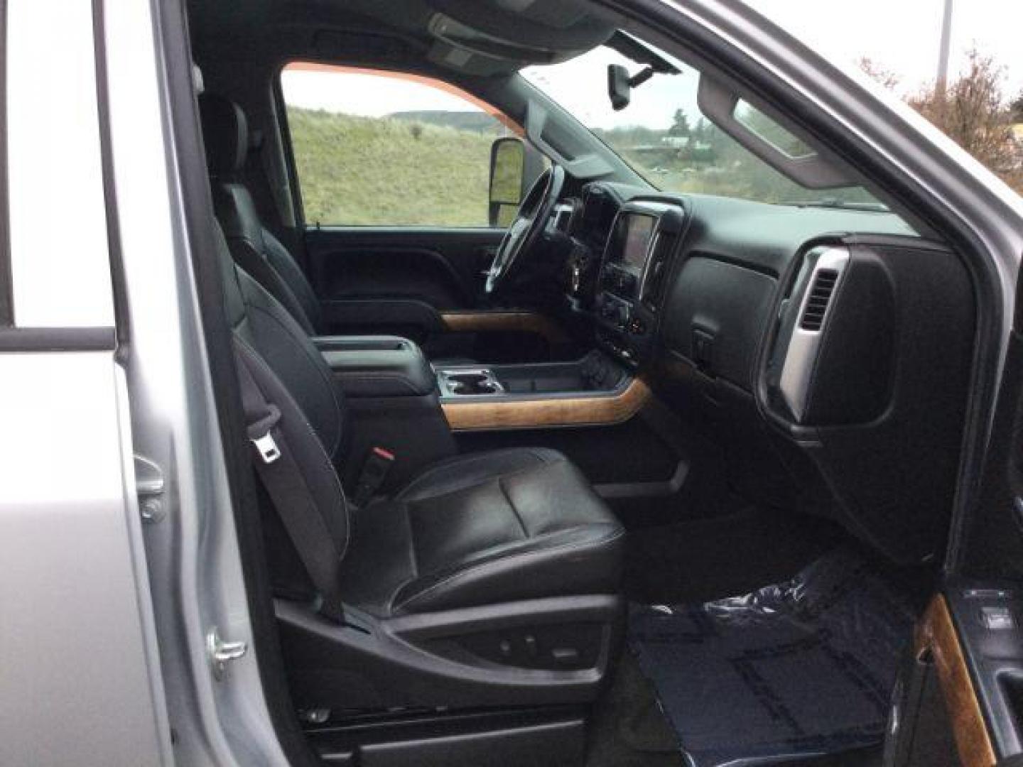 2015 Silver Ice Metallic /Jet Black Chevrolet Silverado 3500HD LTZ (1GC4K0C83FF) with an 6.6L V8 OHV 32V TURBO DIESEL engine, 6-Speed Automatic transmission, located at 1801 Main Street, Lewiston, 83501, (208) 743-9371, 46.417065, -117.004799 - Photo#20